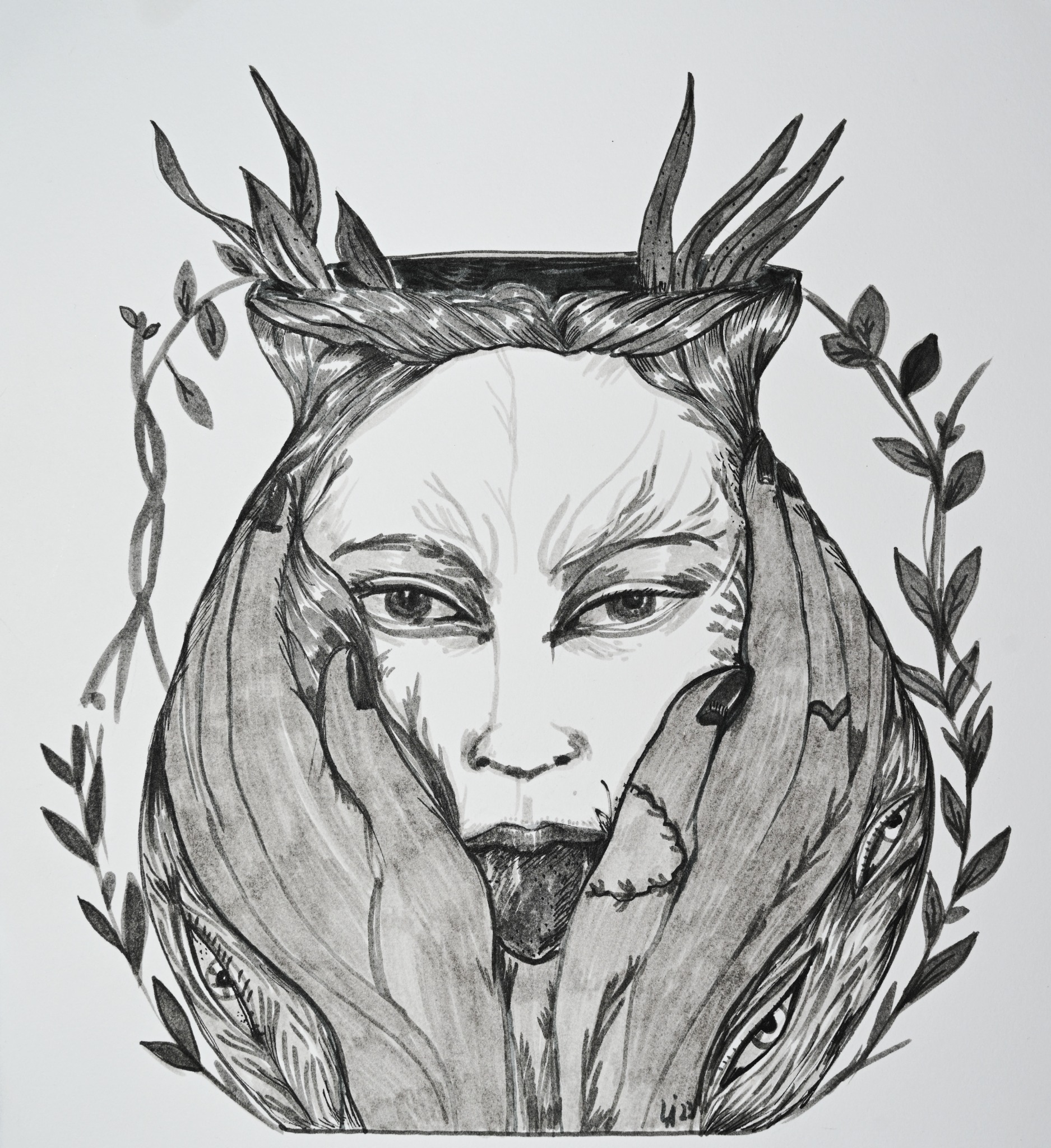 A black-and-white face held by hands inside a vase with braids and branches.